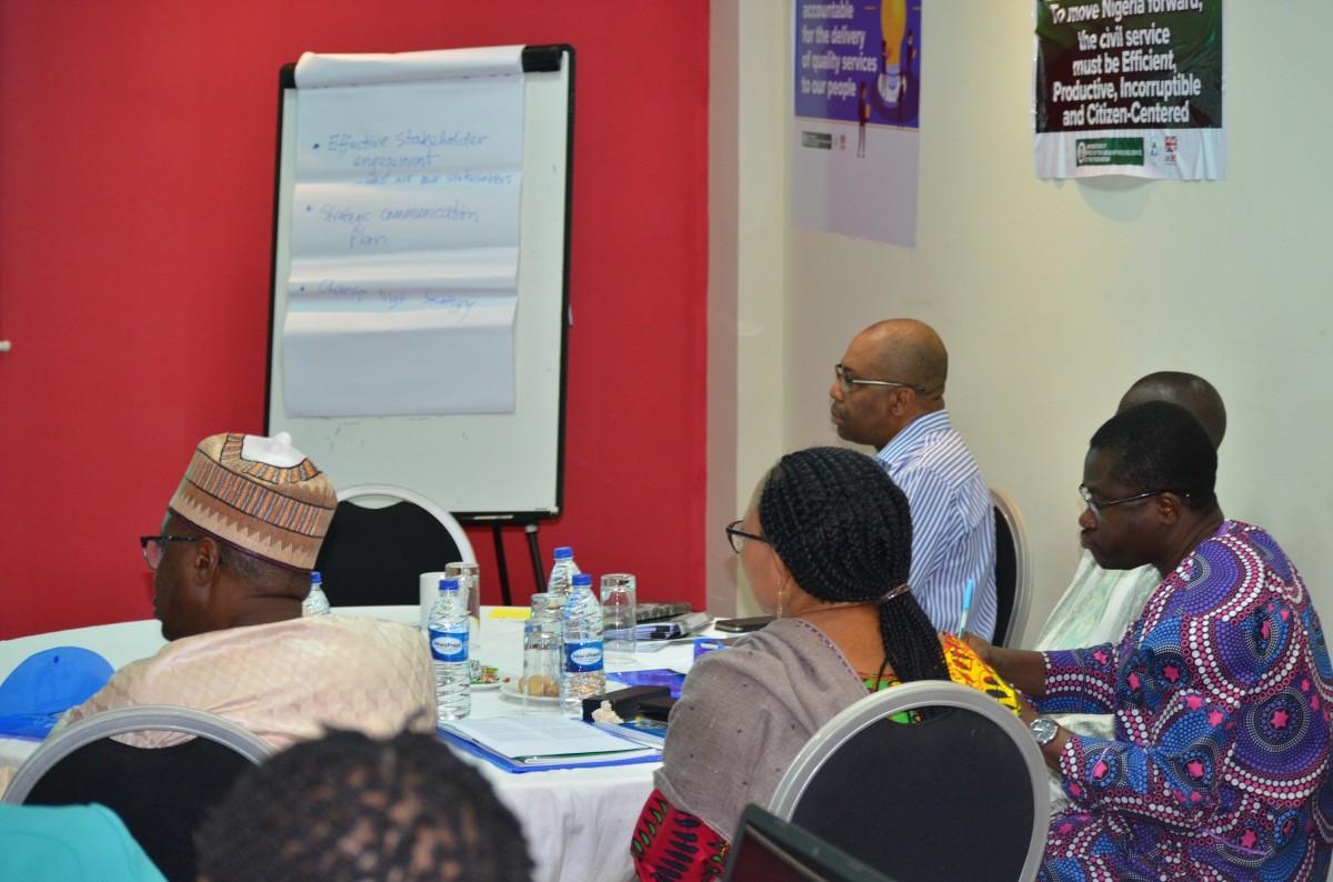 Section of the participants discussing performance management system